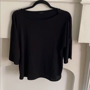 Black top with open sleeves